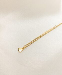 Photo d'une rallonge de chaine en or avec un coeur